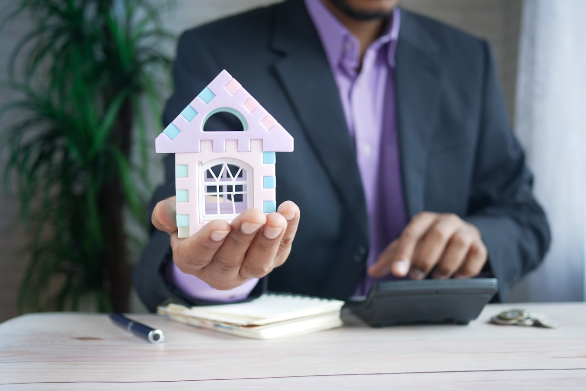 Refinancing Gold Coast borrower reviewing mortgage options on a laptop